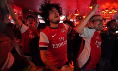 Arsenal wins its first Premier League title in 22 years after Man City draws with Bournemouth