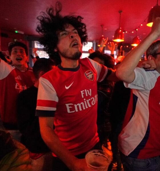 Arsenal wins its first Premier League title in 22 years after Man City draws with Bournemouth