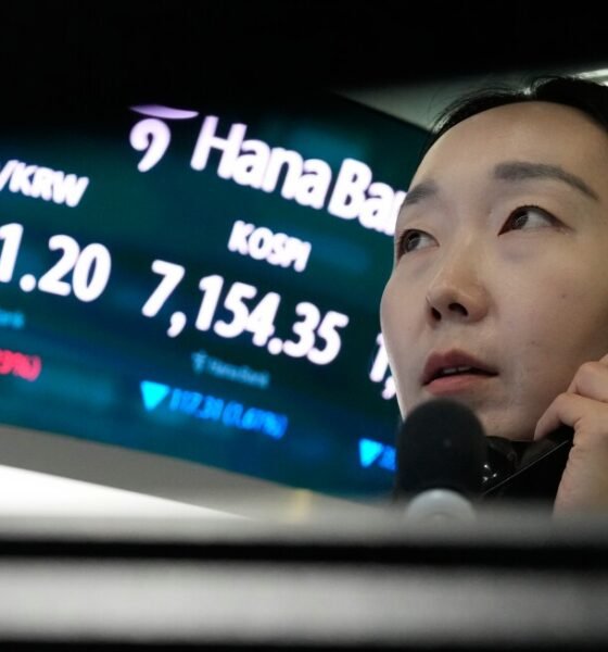 Asian shares surge after oil prices slip and Wall Street resumes its AI rally
