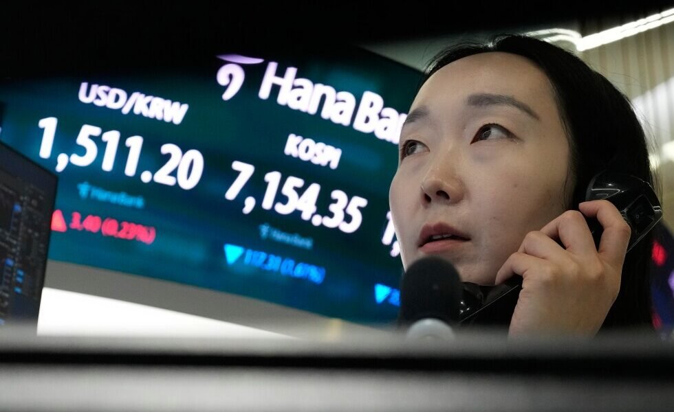 Asian shares surge after oil prices slip and Wall Street resumes its AI rally