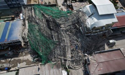 Building under construction in Philippines collapses, leaving 1 dead and 21 trapped