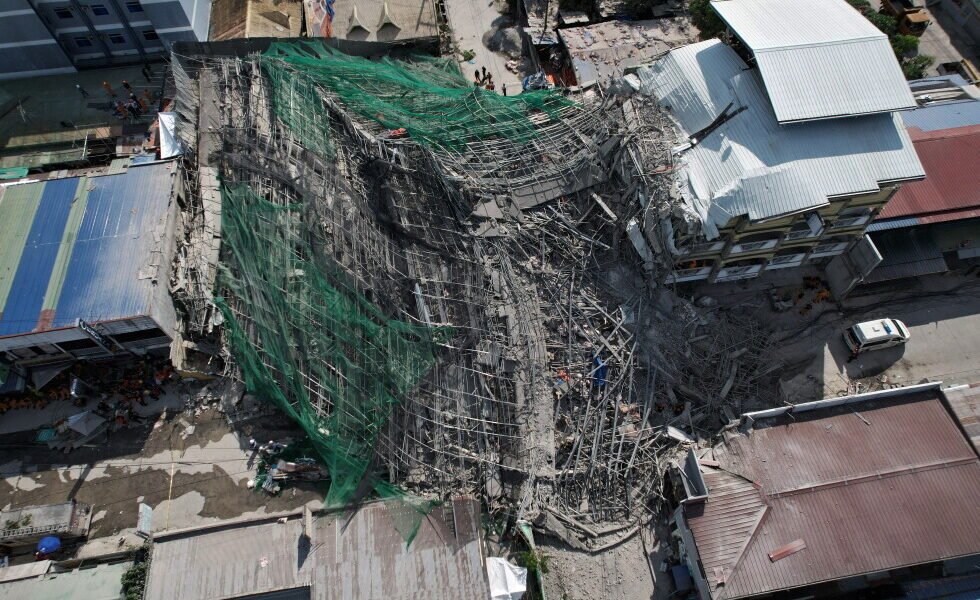 Building under construction in Philippines collapses, leaving 1 dead and 21 trapped
