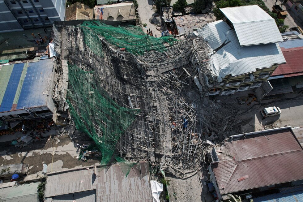 Building under construction in Philippines collapses, leaving 1 dead and 21 trapped