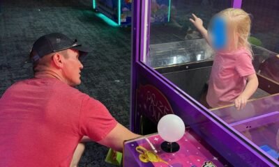 Hero police officer defeats claw machine and rescues trapped child on family bowling night: 'Nerves of steel'