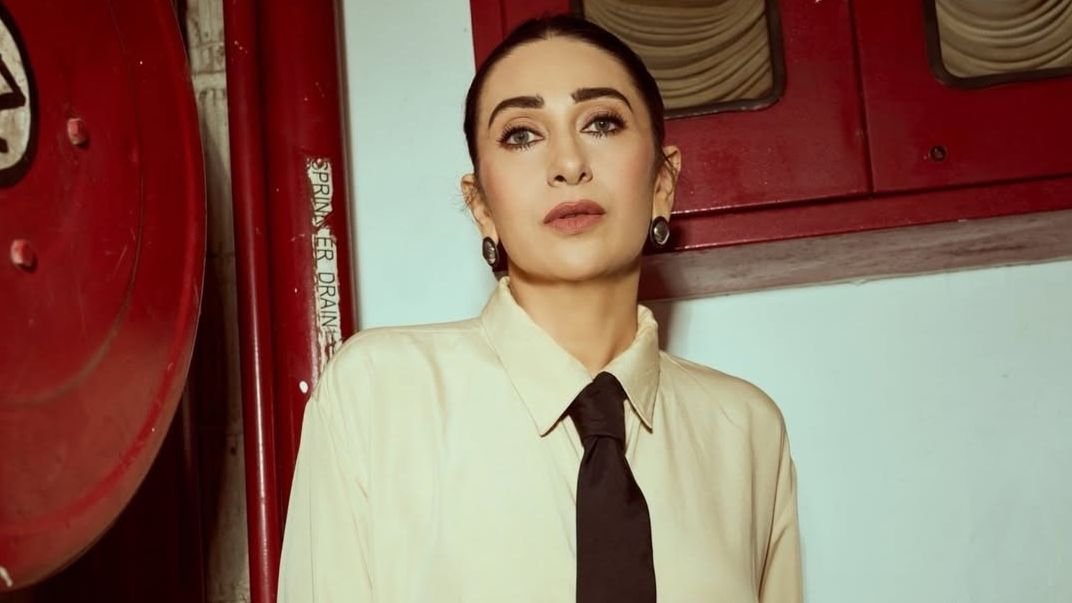 Karisma Kapoor elevated a simple shirt dress with a tie