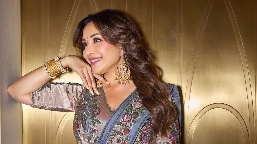 Madhuri Dixit Nenes Mayyur Girotra sari is for those who want to drape their jeans
