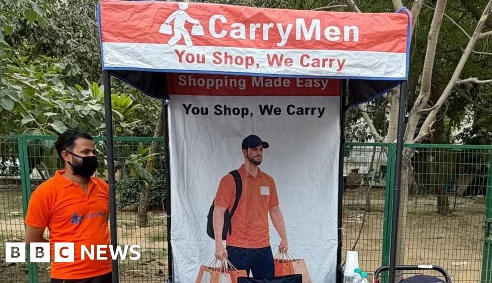 CarryMen: India start-up offering shopping bag carriers sparks debate on entitlement